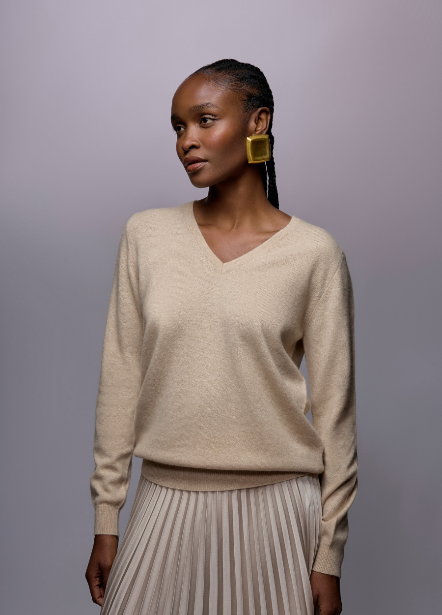 Denner women's V-neck cashmere jumper in Antique White, front view on model