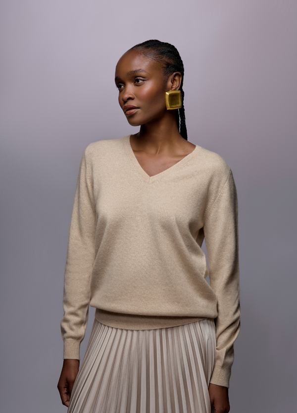 Denner women's V-neck cashmere jumper in Antique White, front view on model