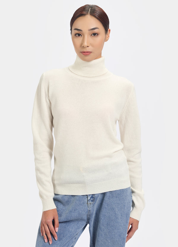 Denner women's roll neck cashmere jumper in Organic White, front view on model